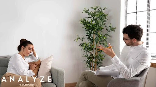 Student talking with a counselor in a bright consultation room